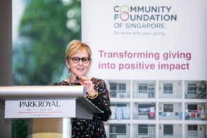 Woman at podium delivering remarks