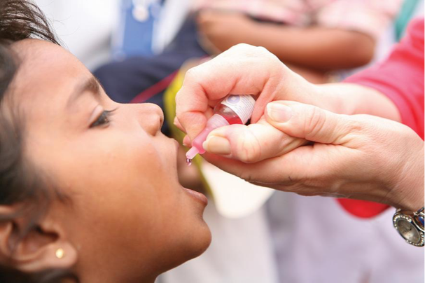 Child being provided a vaccine.