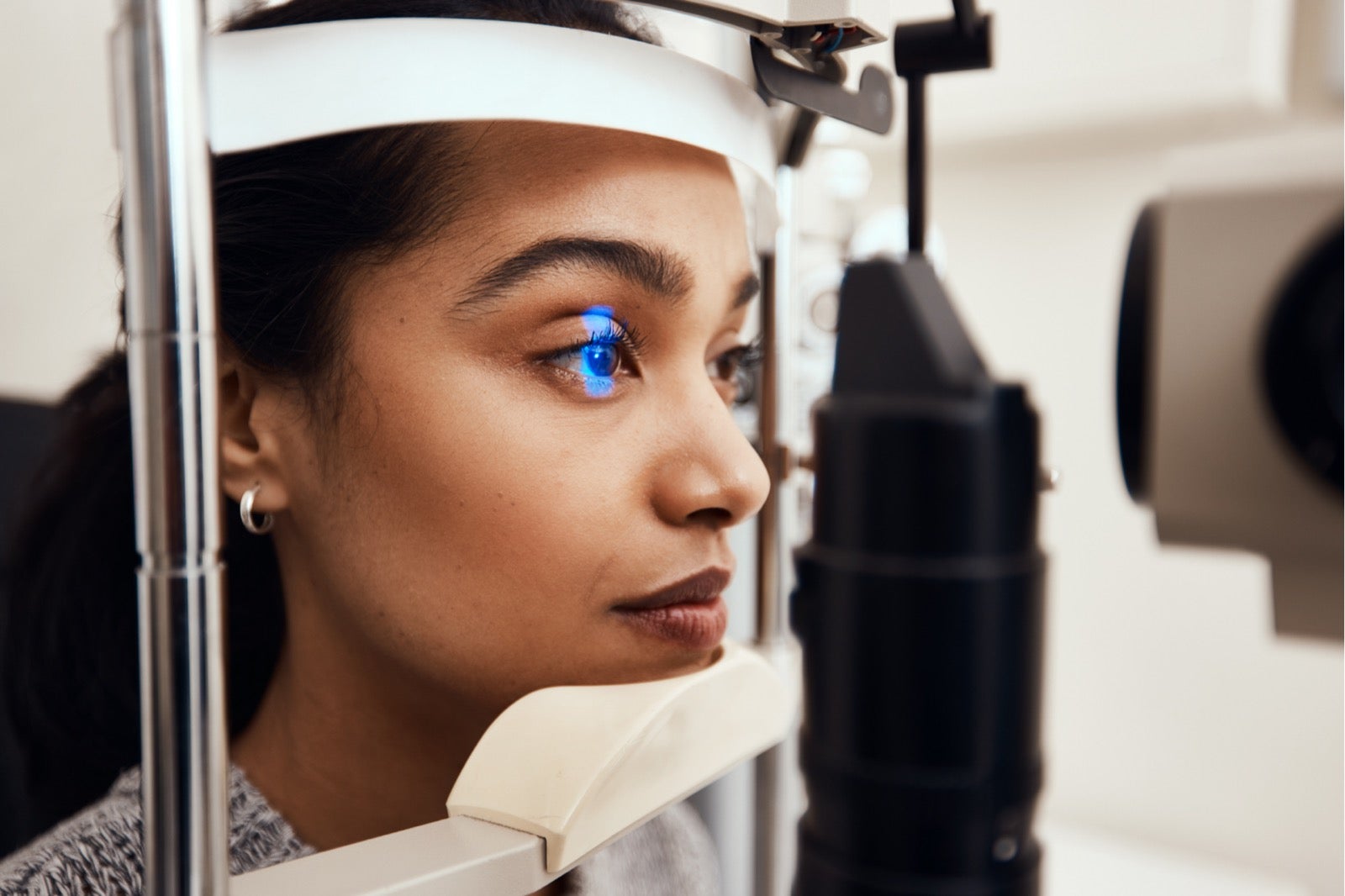 Woman having her eyes scanned.